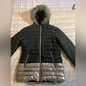 Used navy blue and silver winter coat